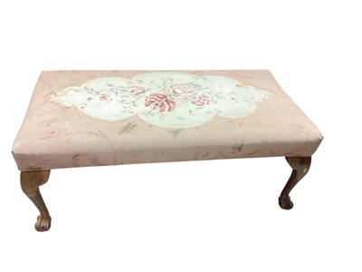 Lot 1466 - Long footstool with floral upholstery on cabriole legs with claw and ball feet