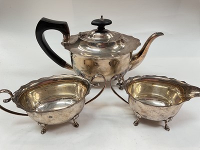 Lot 1153 - Silver three piece tea set (Birmingham 1929)
