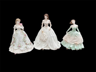 Lot 828 - Two Coalport porcelain ladies and one Royal Worcester (3)