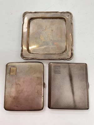 Lot 1158 - Two silver cigarette cases and a small square silver tray (3)