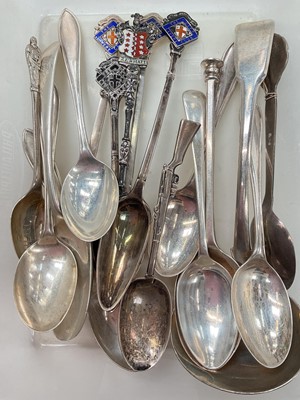 Lot 1159 - Collection of silver and white metal spoons including some enamelled souvenir spoons and a spoon in the form of an air rifle