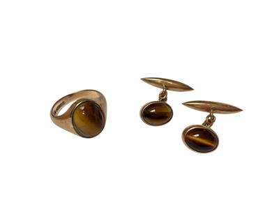 Lot 1 - 1960s 9ct gold tiger's eye ring and pair of 9ct gold mounted tiger's eye cufflinks