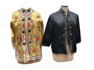 Lot 2098 - Esme Chinese embroidered gold silk robe with flowers, insects and symbols. Oriental style black jacket, 1970's group of clothing including Richard Shops cotton print dress, Berkertex brown zigz...