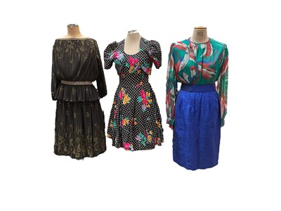 Lot 2099 - Selection of vintage womens clothing including chiffon and dress Donald Campbell dress, Chinese silk dress, St Michael's 1950's button-through floral dress with belt and other St Michael's dress...