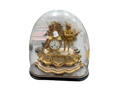 Lot 2443 - Late 19th century French ormolu and alabaster figural clock, with a gentleman playing the lute, on a carved gilt wood stand inside an antique glass dome, the clock 35.5cm high
