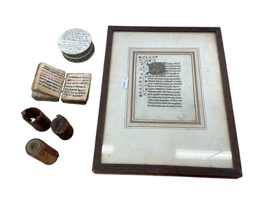 Lot 2417 - Group of items of religious interest, including a miniature holy book on vellum, written in an Abyssinian language and with old paper label, an Ethiopian healing scroll, and a framed manuscript...