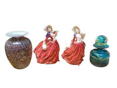 Lot 910 - Two Royal Doulton figures - Autumn Breezes HN1934, together with a Mdina vase with stopper and another art glass vase (4)