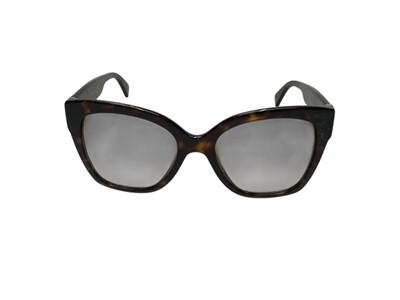 Lot 2106 - Gucci sunglasses GG459S 002 54 19-145 .