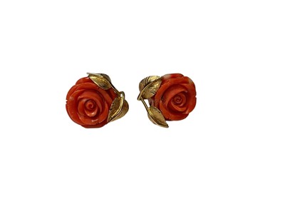 Lot 165 - Pair of Italian gold (stamped 750) carved coral clip-on earrings, each in the form of a rose
