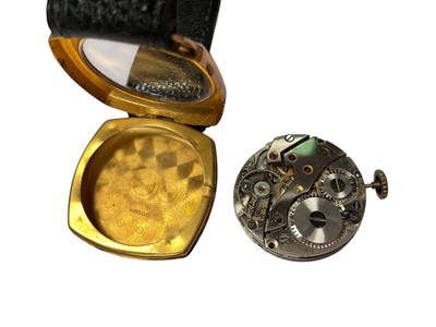 Lot 70 - 1920s 9ct gold cased half hunter wristwatch and one other 9ct gold cased Shield wristwatch, both on black leather straps