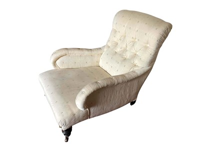 Lot 1476 - Victorian deep armchair in the manner of Howards