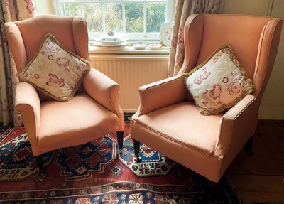 Lot 1477 - 19th century salmon pink upholstered wing armchair on turned legs