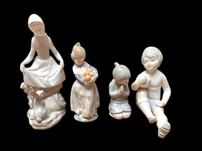 Lot 773 - Six Spanish figures including Lladro, Nao and others, together with a Goebel figure and another figure (8)