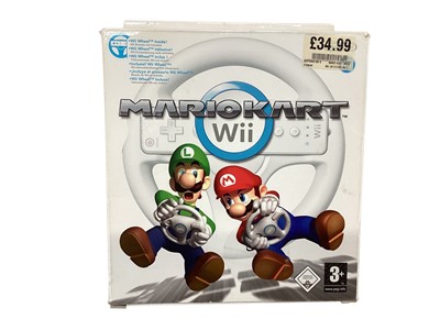 Lot 1984 - Mario kart Wii steering wheel controller holder, Mario soft toy & Ninja Turtle, Sony Walkman, Tazos and diecast (1 box)