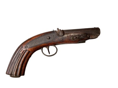 Lot 709 - Mid-19th century Continental percussion overcoat pistol with octagonal barrel, engraved side lock ( cock missing), fluted walnut stock with shell butt trap 22cm overall, the barrel 10.8cm