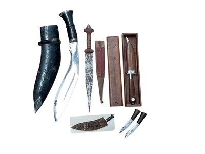 Lot 713 - Indian Kukri and other daggers