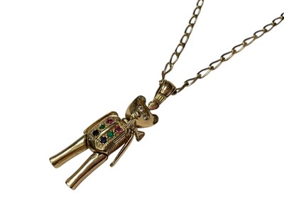 Lot 105 - 9ct gold multi-gem set articulated bear pendant on 9ct gold chain