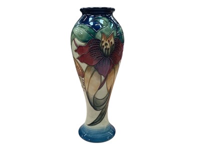 Lot 1008 - Moorcroft pottery vase decorated in the Anna Lily pattern, 27cm high