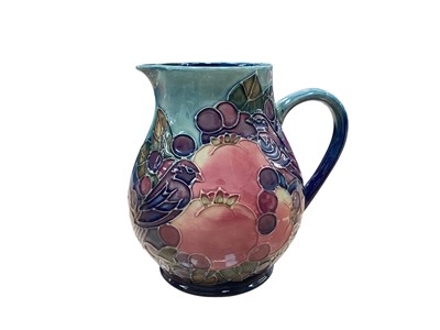 Lot 1013 - Moorcroft pottery jug decorated in the Finches pattern, 14.5cm high