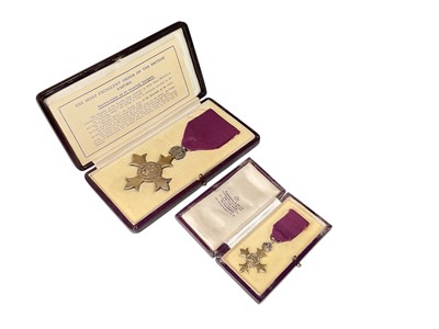 Lot 720 - Officers of The Most Excellent Order of the British Empire (O.B.E.) medal, civil type, hallmarked for London 1934, in Garrard & Co box of issue, together with miniature medal, also in box of...