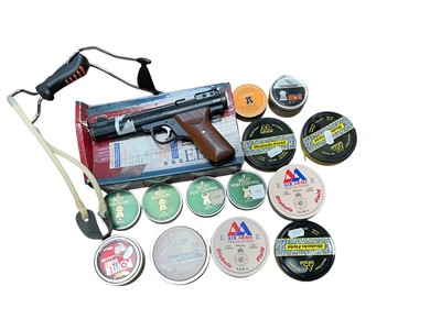 Lot 723 - Crosman Benjamin .22 air pistol together with various tins of pellets.