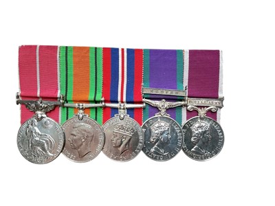 Lot 725 - Second World War and later medal group comprising British Empire Medal (B.E.M.), military type named to 7897332 A/SQDN. Q.M.S. Eric Adams. 16th / 5th Lancers R.A.C., Defence medal, War medal, El...