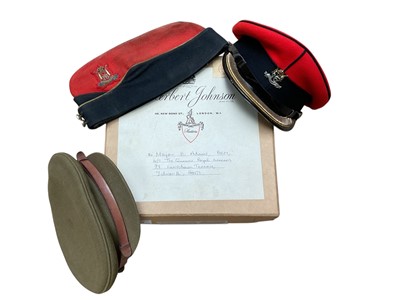 Lot 727 - Two 16th / 5th The Queen's Royal Lancers officers' caps, together with a side cap in a Herbert Johnson hat box named to Major E. Adams B.E.M. (3)