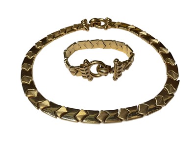 Lot 123 - Italian yellow metal (stamped 14K) articulated panel link necklace and matching bracelet