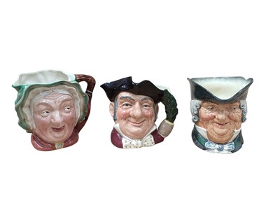 Lot 1044 - Five Royal Doulton character jugs - Merlin D6529, Dick Turpin, Lobster Man D6617, Mine Host D6468 and Parson Brown, together with a Beswick character jug - Sairey Gamp (6)