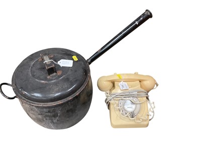 Lot 2423 - 1960's cream telephone with Chelmsford 75044 badge to centre, together with a black enamel saucepan (2).