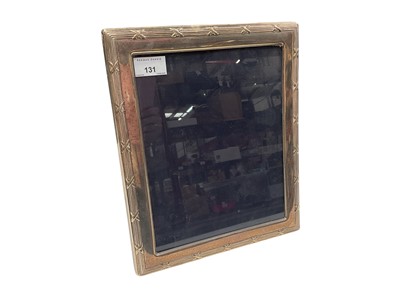 Lot 131 - Large contemporary silver photograph frame of rectangular form with reeded border and easel back, (Sheffield 1997), maker Carrs, 31 x 26 cm overall