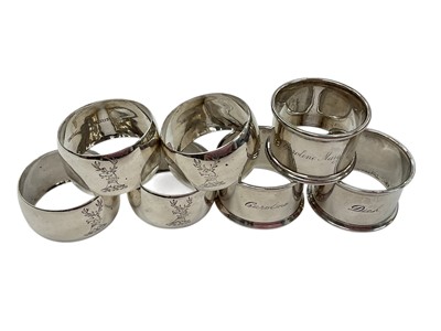 Lot 140 - Group of seven silver napkin rings, including one engraved 'Dick', (various dates and makers), all at approximately 5ozs (7).