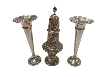 Lot 183 - Victorian silver sugar caster (London 1892), together with a pair of Elizabeth II silver spill vases (Birmingham 1969 / 1970) (3).