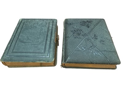 Lot 1245 - Victorian illustrated photograph albums. One of popular verse and the Charles Dickens album with scenes from his published works. Over 90 cartes de visite and cabinet cards within (2)