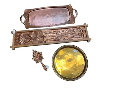 Lot 2431 - Art Nouveau relief copper panel together with an Art Nouveau copper tray by Joseph Sankey and Sons, a brass tray and copper spoon rest (4).