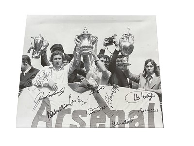 Lot 1224 - Two signed framed Arsenal pictures, canvas of double winning players signed by ten and a glazed pictures signed by five