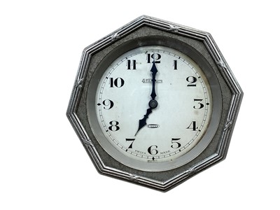 Lot 2180 - Art Deco chromium plated car clock of octagonal form with silvered Arabic numeral dial and blued steel hands, case 6.6cm in diameter.