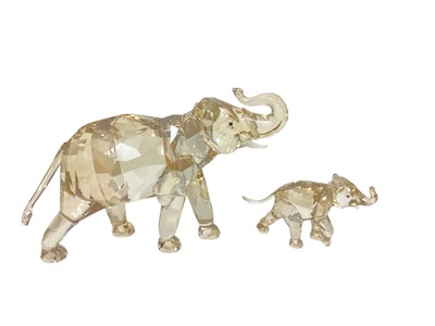 Lot 1080 - Swarovski Crystal annual edition 2013 - Cinta Elephant with plaque, together with baby elephant, both boxed