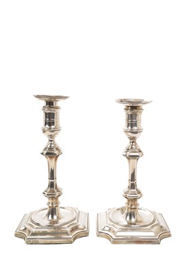 Lot 575 - Pair of Edwardian silver candlesticks