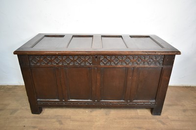Lot 1317 - 18th century oak coffer, four panel rising top and front with carved geometric frieze, on block feet