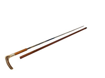 Lot 745 - Good quality 19th century sword stick, the tapered steel blade with blue and gilt decoration, with malacca outer shaft, horn knop and silver plated collar, 91cm overall, the blade 67.5cm overall...