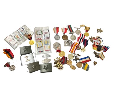 Lot 748 - Two Second World War Italy campaign sweetheart bracelet panels, together with medal ribbons, badges and other Militaria (1 box).