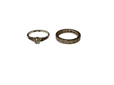 Lot 303 - 18ct white gold diamond ring, together with a diamond eternity ring (2)