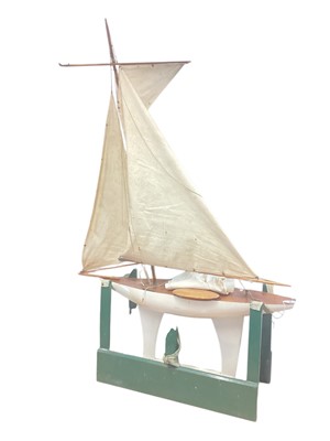 Lot 2576 - Old painted model pond yacht with cloth sails, on stand, total length 104cm
