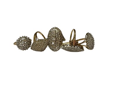 Lot 260 - Five 9ct gold diamond set cluster rings