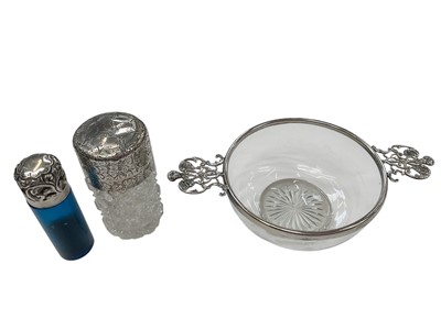 Lot 272 - Late Victorian cut glass dish with applied silver mount, (London 1899), maker William Comyns, together with two silver mounted cut glass scent bottles (various dates and makers).
