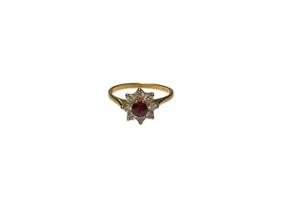 Lot 290 - Diamond and ruby flower head cluster ring on 18ct gold shank