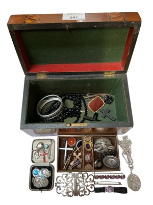 Lot 291 - Wooden work box containing antique and later jewellery to include Victorian silver bangle, silver buckle, various cross pendants, agate brooches, Georgian flat cut garnet and seed pearl mourning...