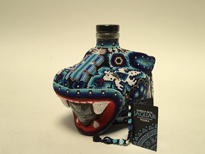 Lot 734 - One bottle, Chaquira Blanco Tequila, Reserva de el Jaguar, in beaded Jaguar formed head, in presentation display case