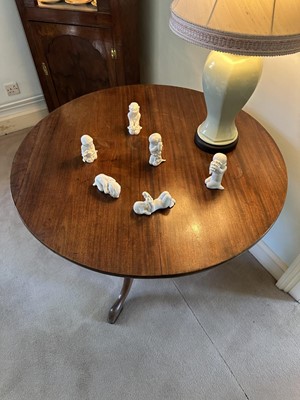 Lot 1254 - George III style mahogany tripod supper table, the circular tilt top on shaped column and three splayed legs, 91cm diameter